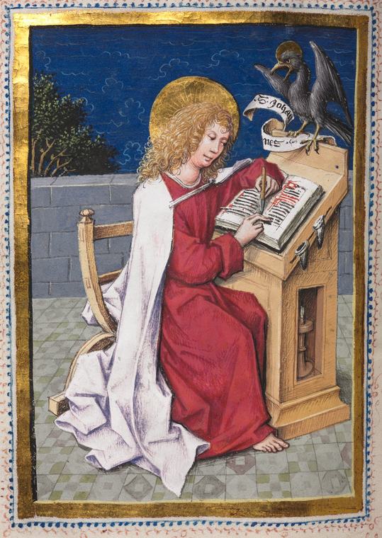 A curly-haired saint in a red robe and white mantle sits at a slanted wooden desk, touching a knife and a quill to an open manuscript page while a dark eagle perches on the desk beside a scroll.