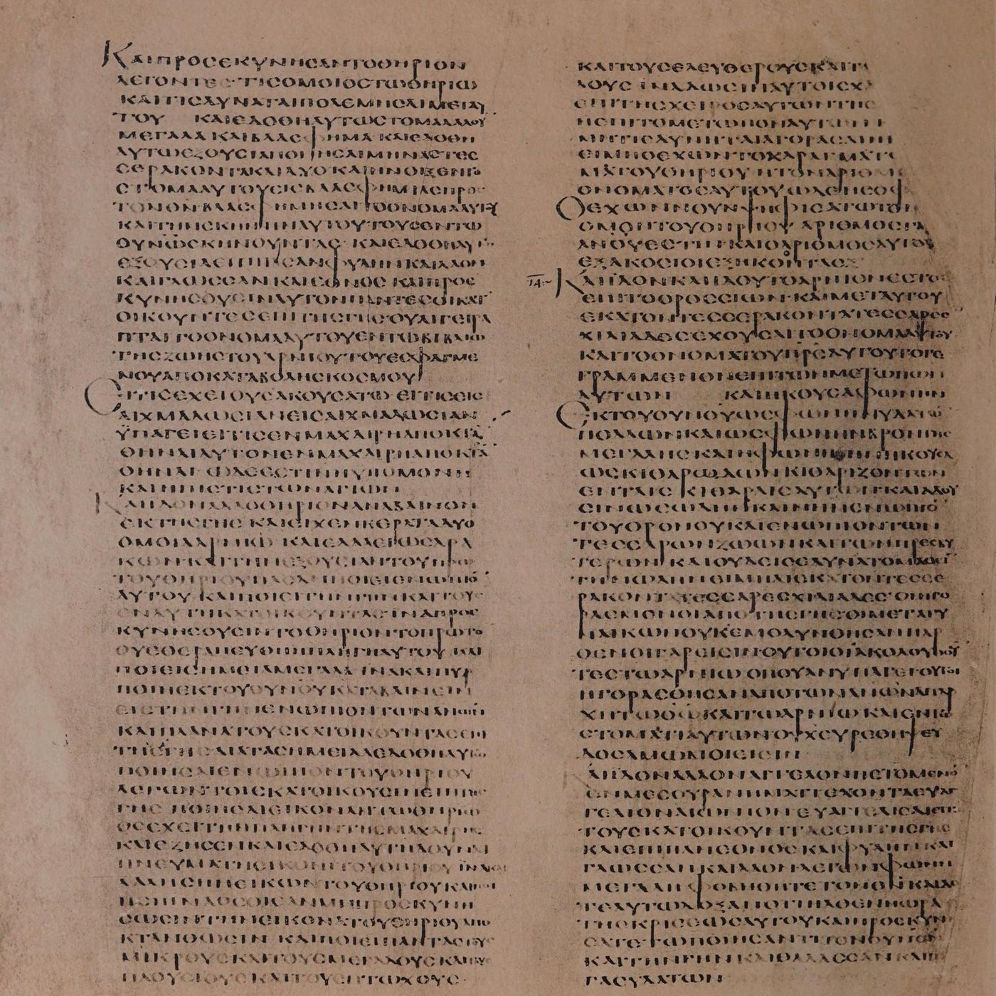 A page of ancient Greek capital-letter script in two columns on pinkish-tan parchment, with a small chapter marker beside the right-hand column.
